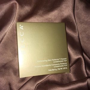 BECCA Highlighter in “Champagne Pop”